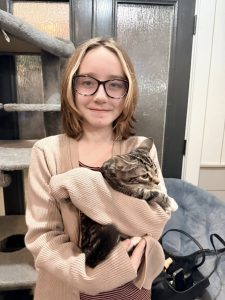 little girl with adopted kitten