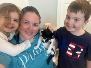 Family after adopting a kitten