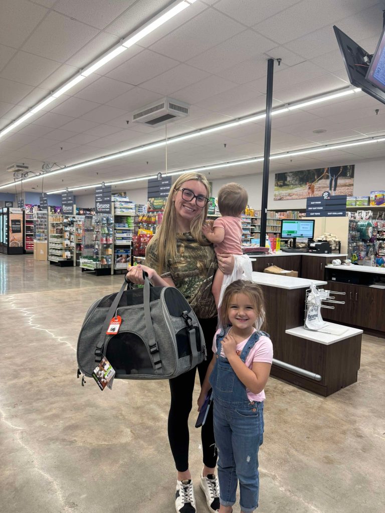 family with adopted cat